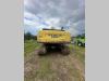 New Holland 305 Foto 11 thumbnail