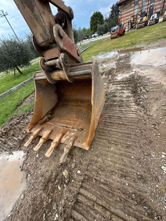 New Holland 305 Foto 9