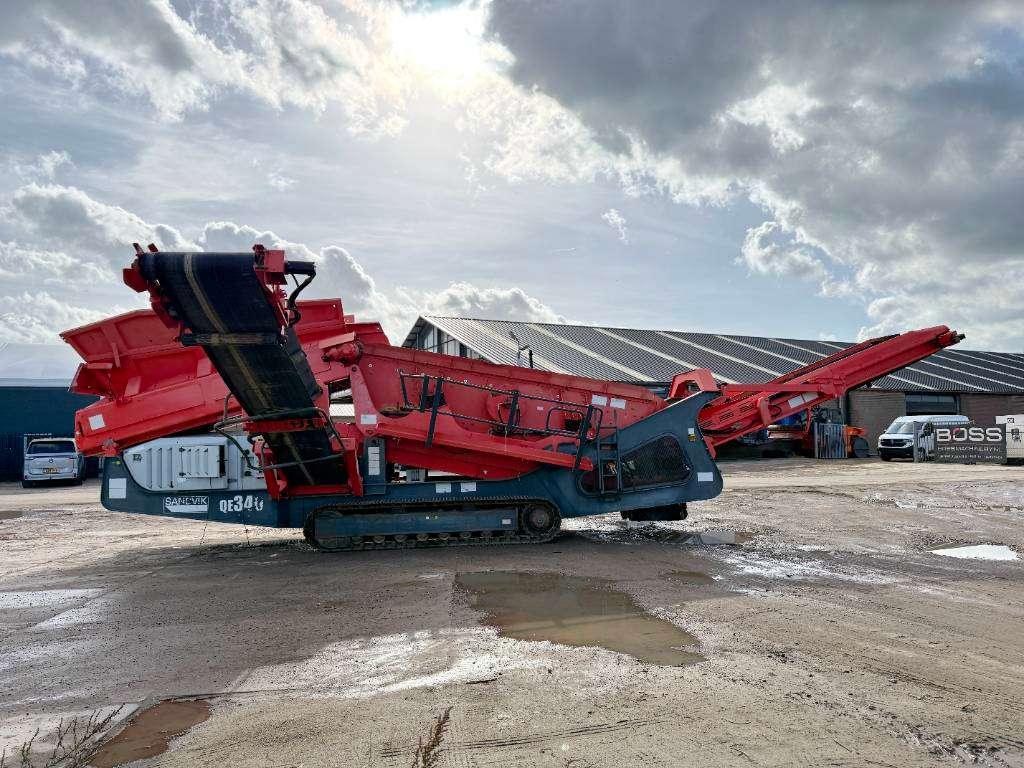 Sandvik QE340 - Caterpillar Engine / 2 Side Convey Foto 6