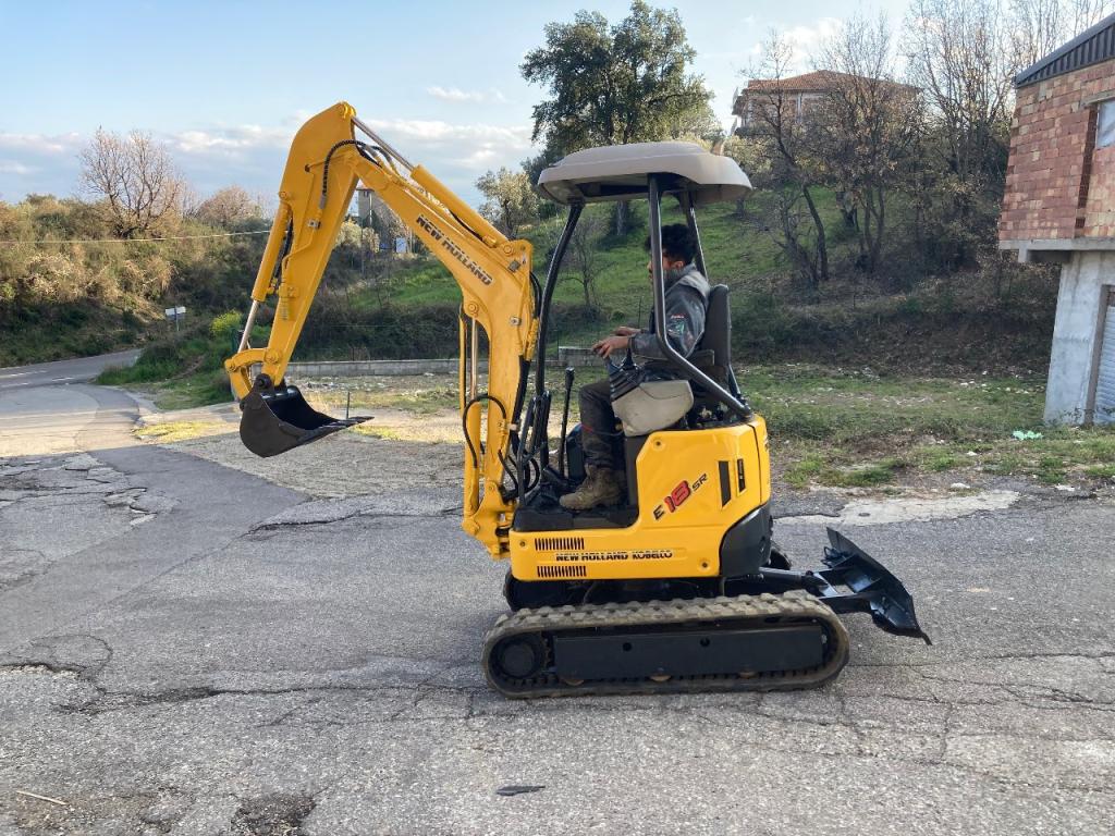 New Holland 18 sr Foto 1