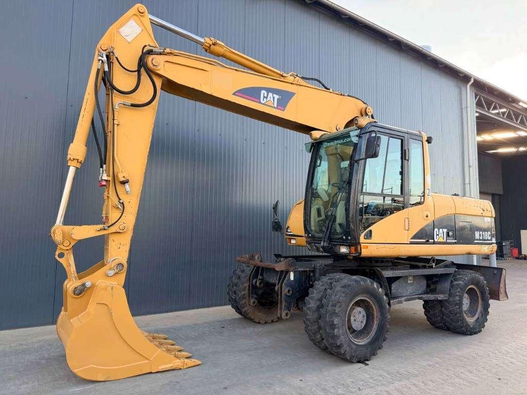 Caterpillar M318C Foto 1