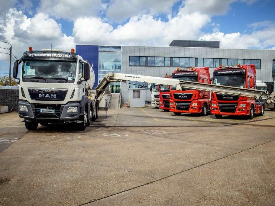 Man TGS 32.400BB+LIEBHERR 8M³+BAND/TAPIS 16m Foto 1
