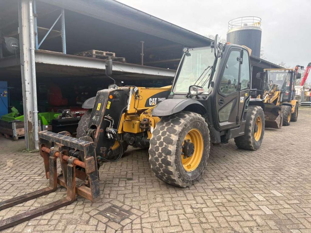 Caterpillar TH408D Foto 1