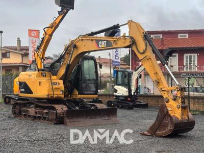 Caterpillar 311CU in vendita da DAMAC