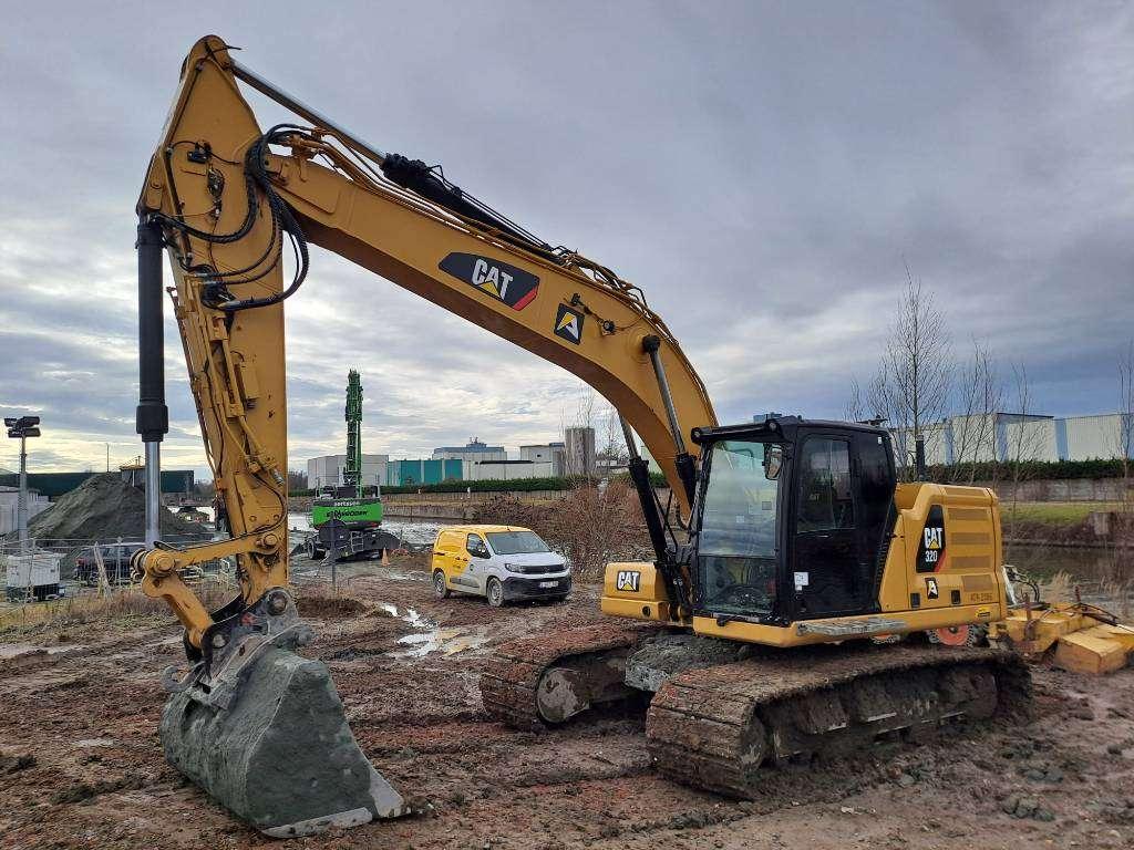 Caterpillar 320 Foto 1