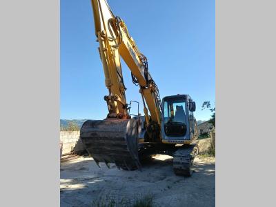 New Holland E145 Foto 1
