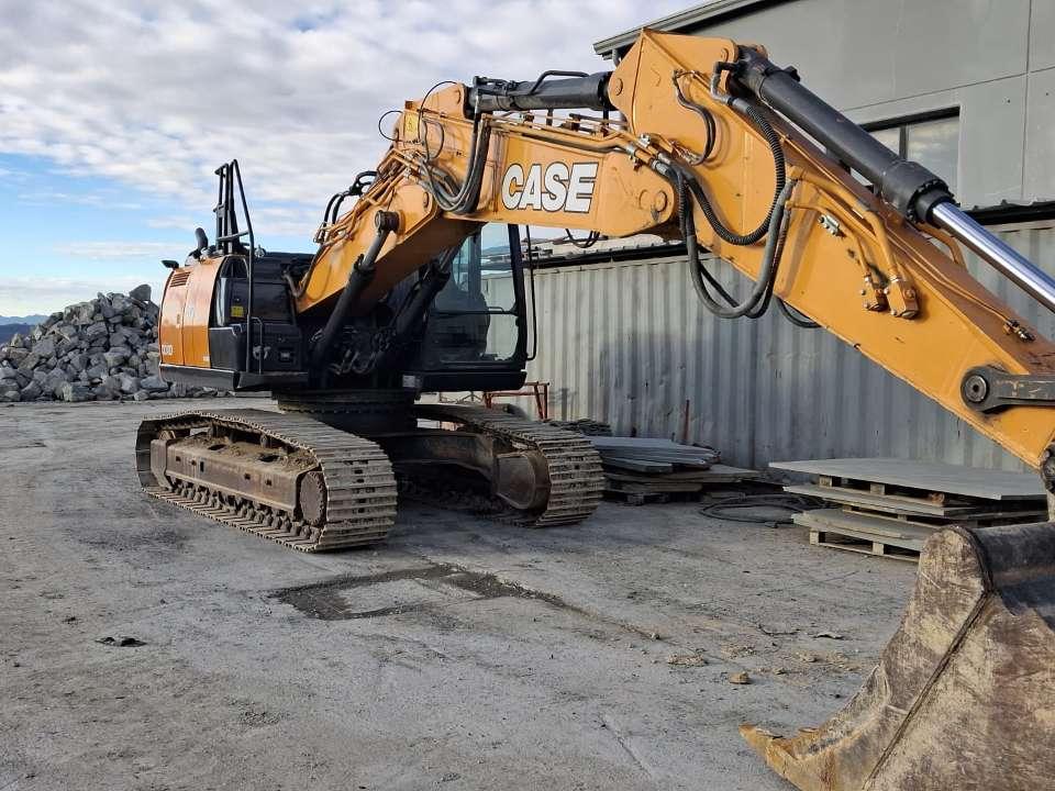 Case CX240D TRIPLICE Foto 1