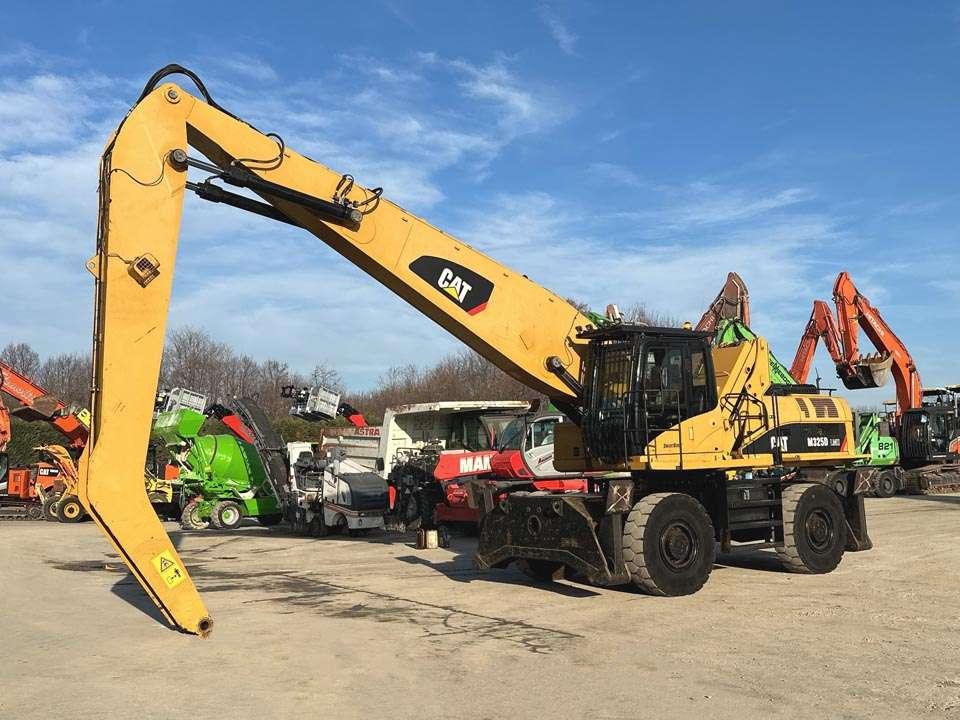 Caterpillar M325D 4X4 Foto 1