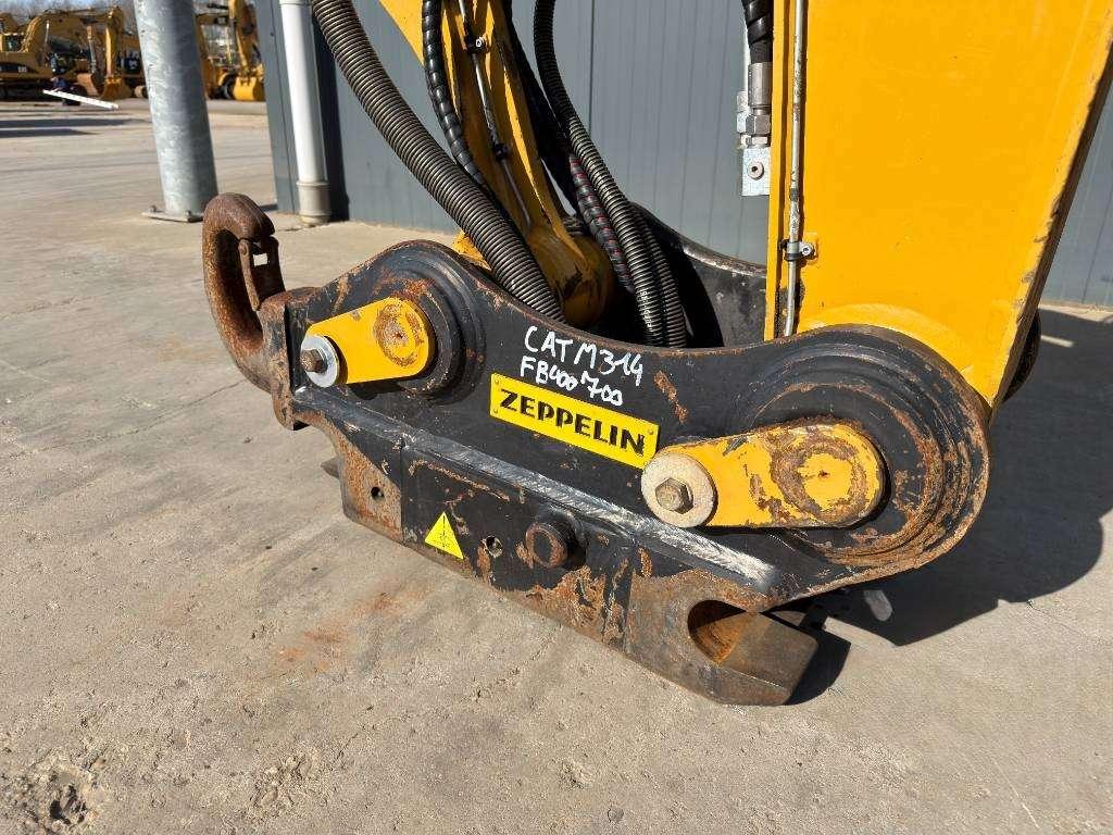 Caterpillar M315F - With OilQuick Foto 10
