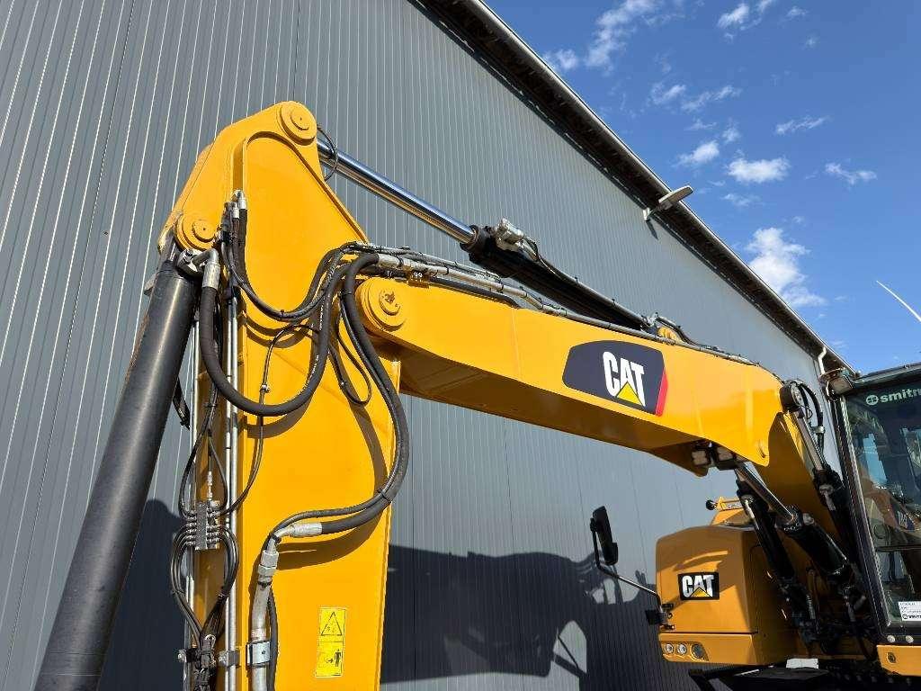 Caterpillar M315F - With OilQuick Foto 15