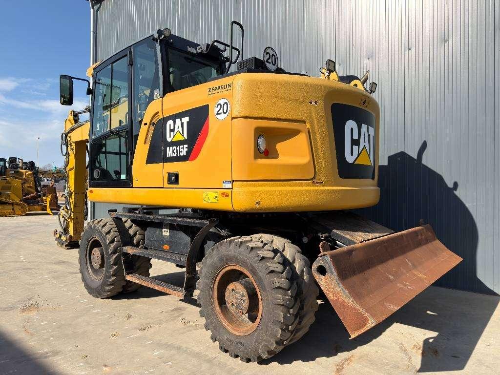 Caterpillar M315F - With OilQuick Foto 3