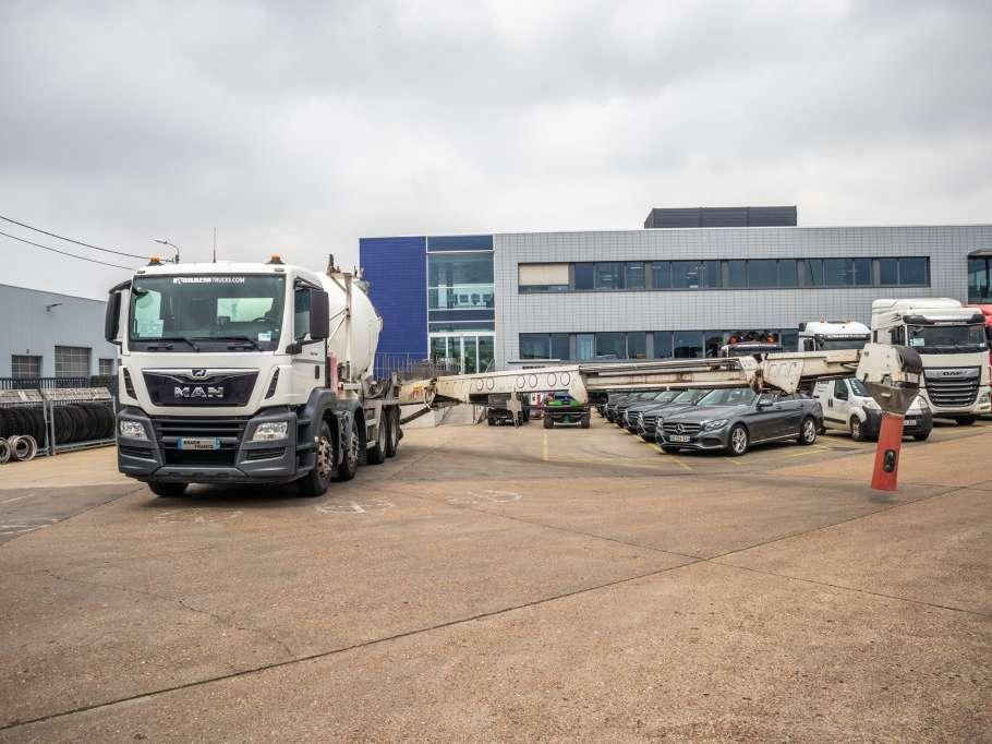 Man TGS 32.360+PUTZMEISTER8M³+BAND/BELT/TAPIS Foto 1