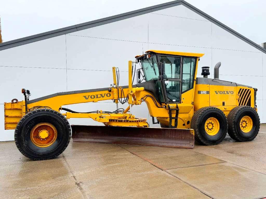 Volvo G990 - 4.85m Blade / Pushblock / Airco Foto 1