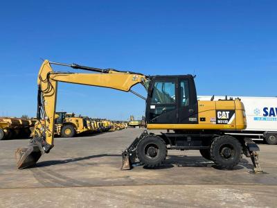 Caterpillar M313D VA - Outriggers + Blade in vendita da Big Machinery