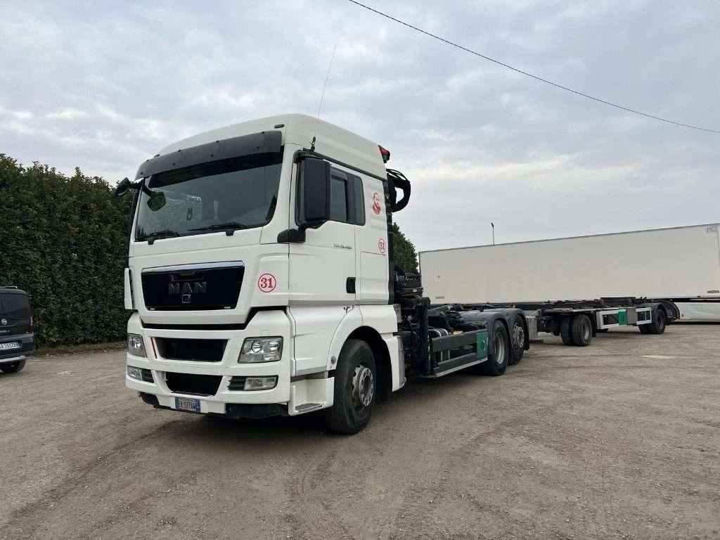Man TGX 26.480 SCARRABILE CON GRU Foto 1