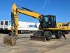 Caterpillar M313D VA - Outriggers + Blade Foto 2 thumbnail