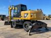 Caterpillar M313D VA - Outriggers + Blade Foto 3 thumbnail