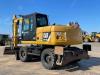 Caterpillar M313D VA - Outriggers + Blade Foto 6 thumbnail