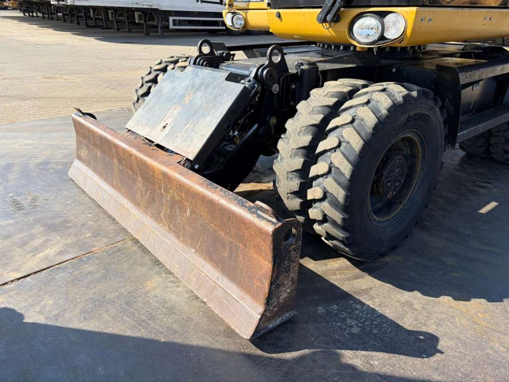 Caterpillar M313D VA - Outriggers + Blade Foto 25