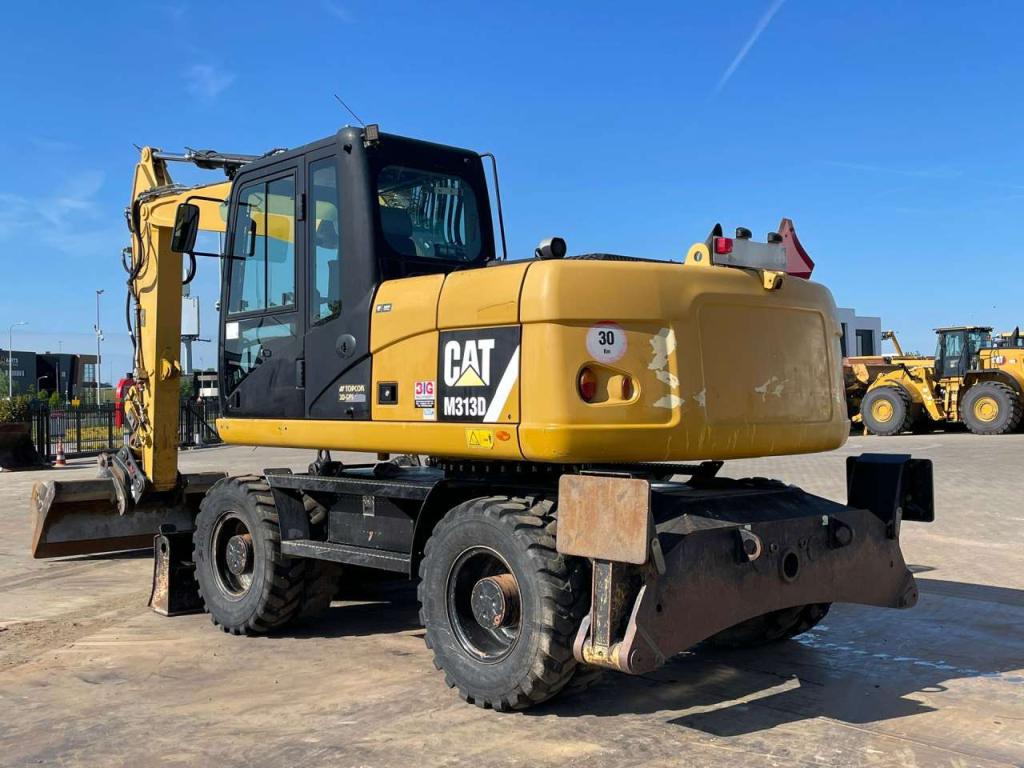 Caterpillar M313D VA - Outriggers + Blade Foto 6