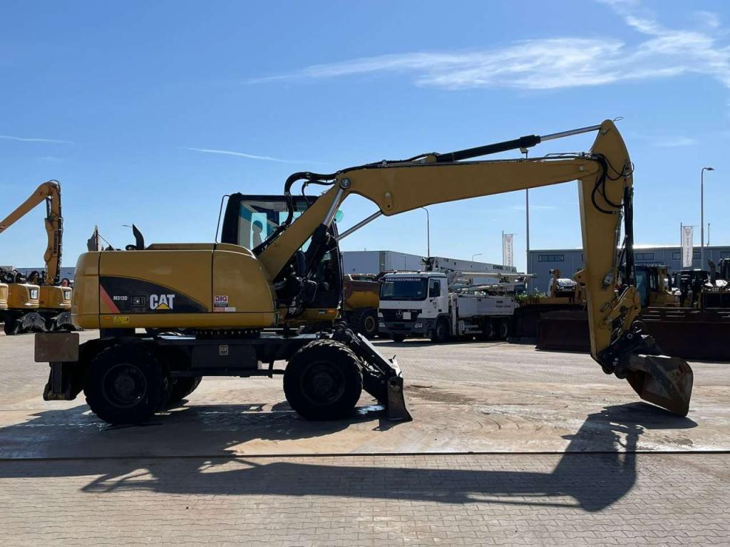 Caterpillar M313D VA - Outriggers + Blade Foto 9