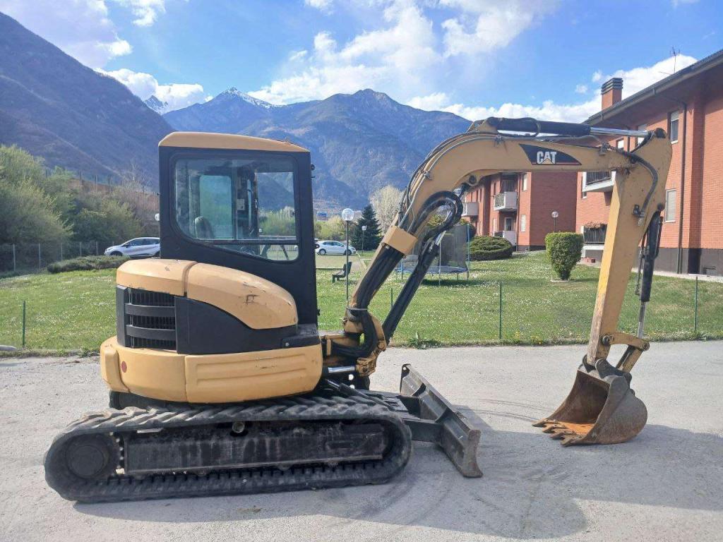 Caterpillar 304 Foto 1