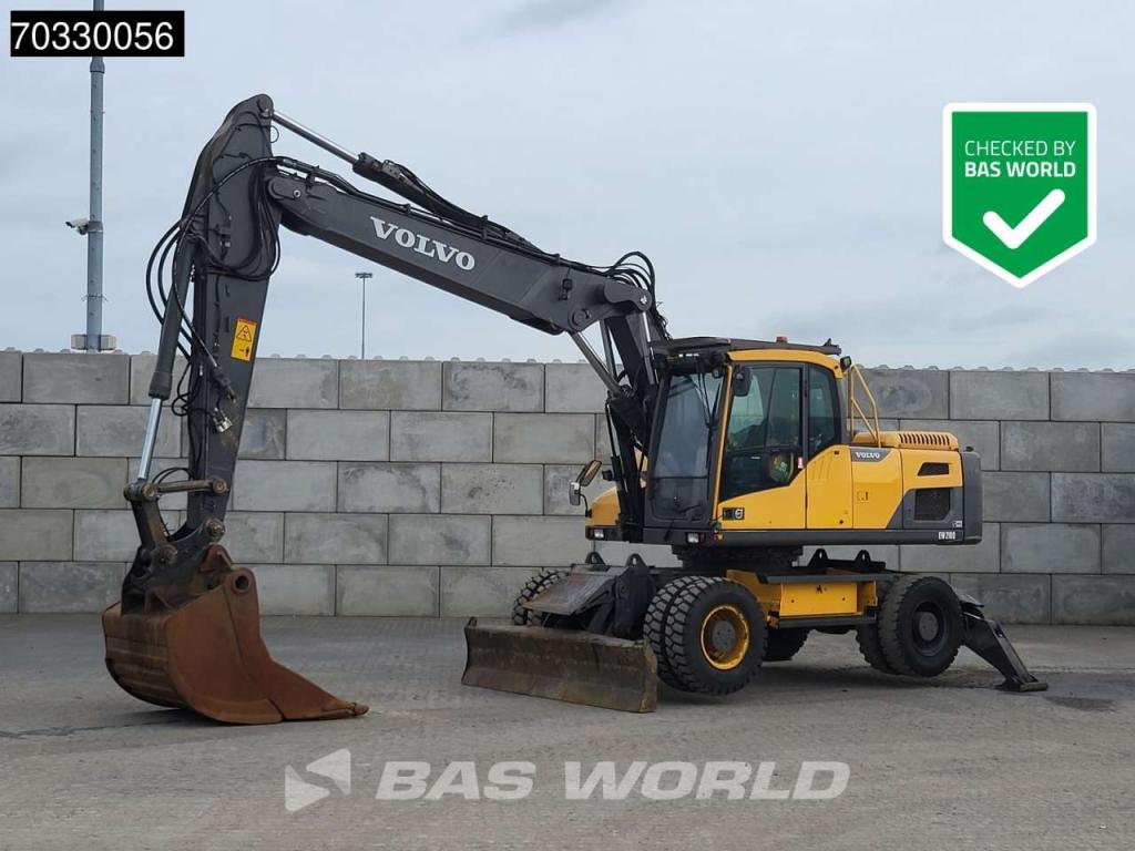 Volvo EW210 D Outrigers + Blade Foto 1