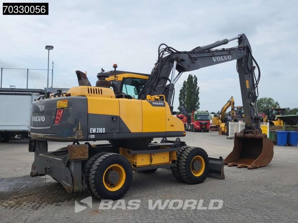 Volvo EW210 D Outrigers + Blade Foto 10