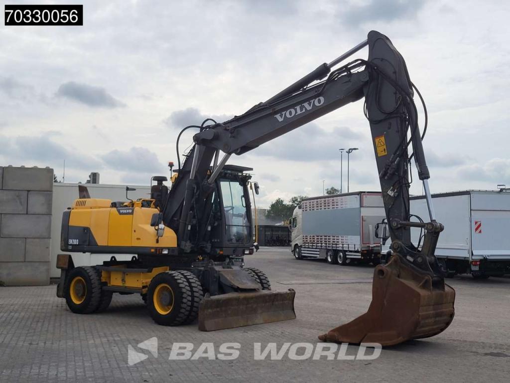 Volvo EW210 D Outrigers + Blade Foto 11