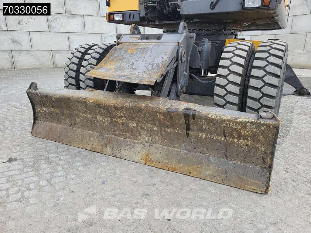Volvo EW210 D Outrigers + Blade Foto 30