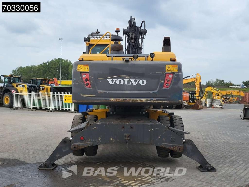 Volvo EW210 D Outrigers + Blade Foto 6