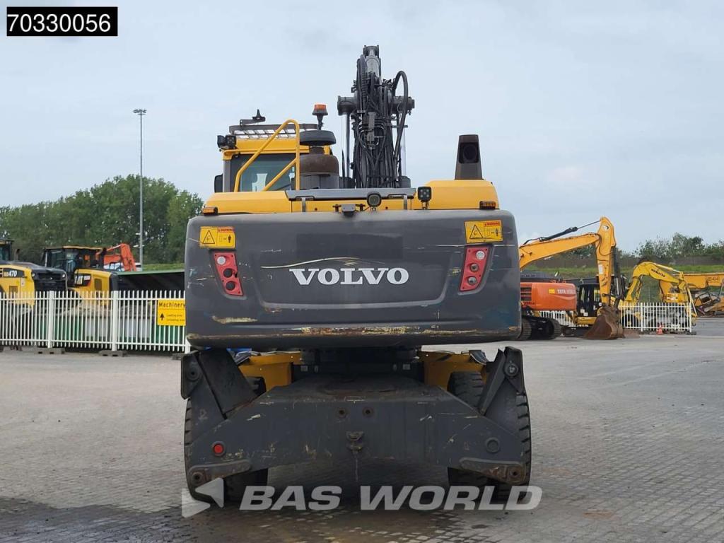 Volvo EW210 D Outrigers + Blade Foto 8