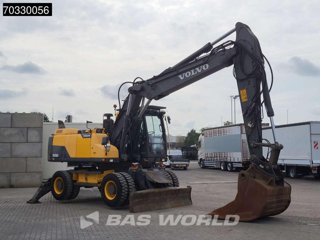 Volvo EW210 D Outrigers + Blade Foto 9